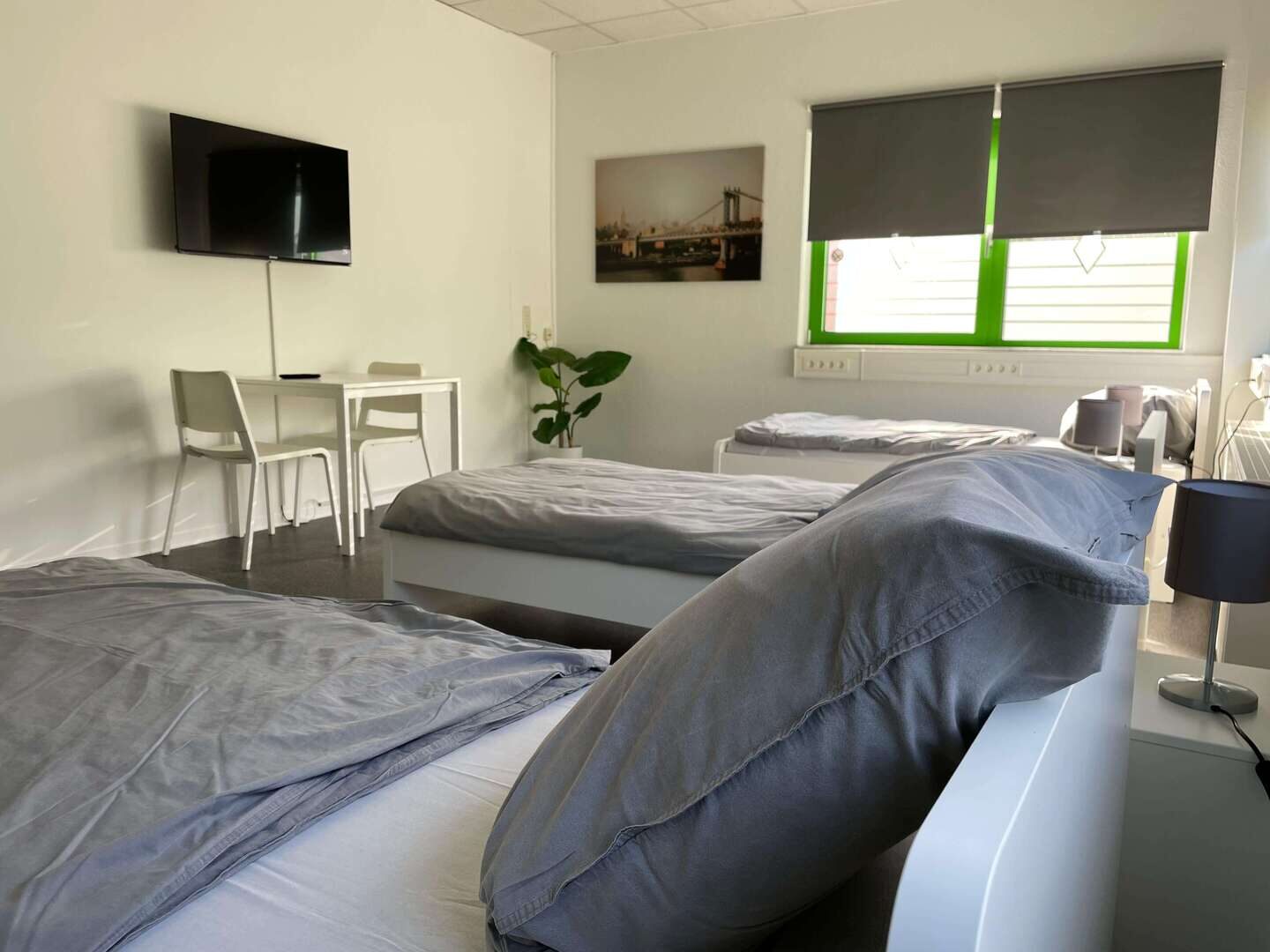 Schlafzimmer mit zwei Einzelbetten — Corporate Housing Boardinghouse Darmstadt